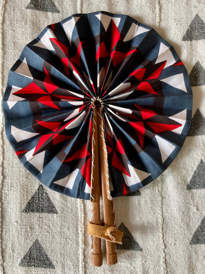 Fan- Collapses for easy storage, made from African wax fabric