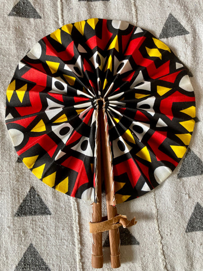 Fan- Collapses for easy storage, made from African wax fabric