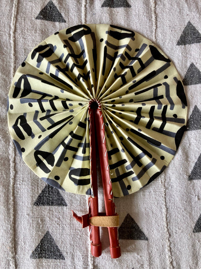 Fan - folds up for convenient storage, made out of African wax fabric