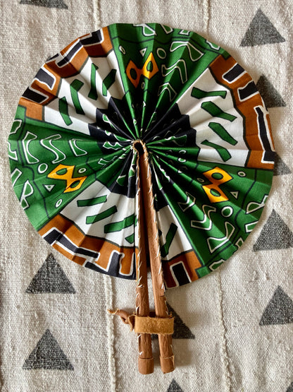 Fan- Collapses for easy storage, made from African wax fabric