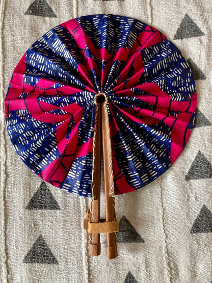 Fan- Collapses for easy storage, made from African wax fabric